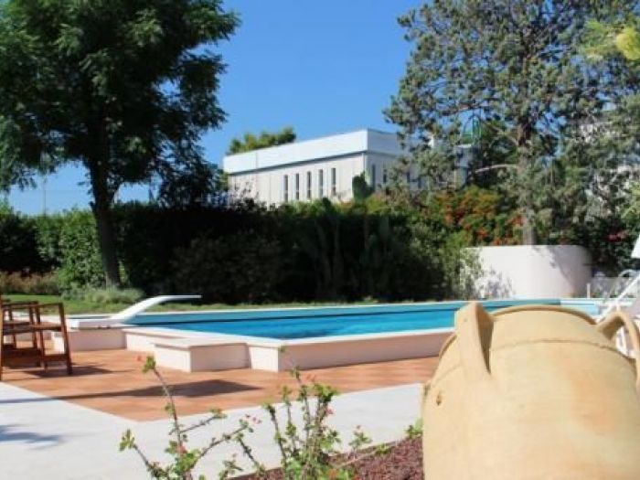 Archisio - Enrica Leonardis - Progetto Giardino e bordo piscina in villa urbana