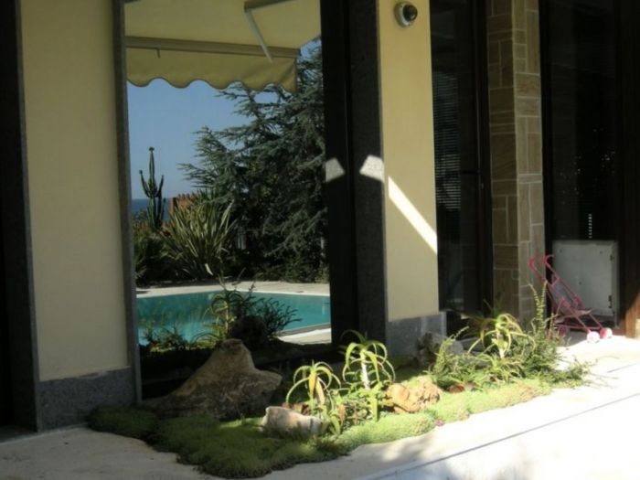 Archisio - Tiziana Galosi - Progetto Progettazione piscina e giardino di una villetta