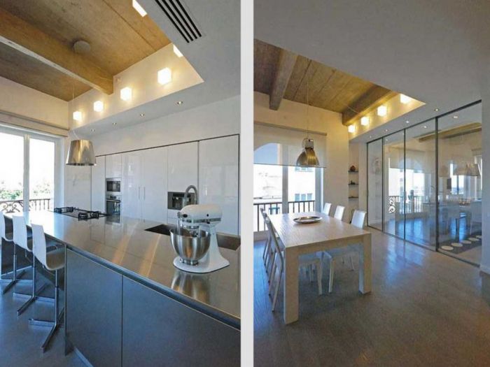 Archisio - Roberto Silvestri - Progetto Luce materiali spazio e una grande cucina