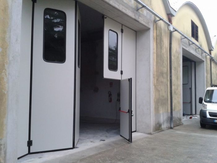 Archisio - Gr Porte - Progetto Porte industriali - porte a libro e porte scorrevoli industriali