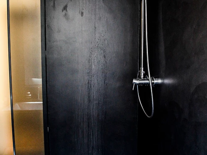 Archisio - Martina Stancati - Progetto Black concrete bathroom