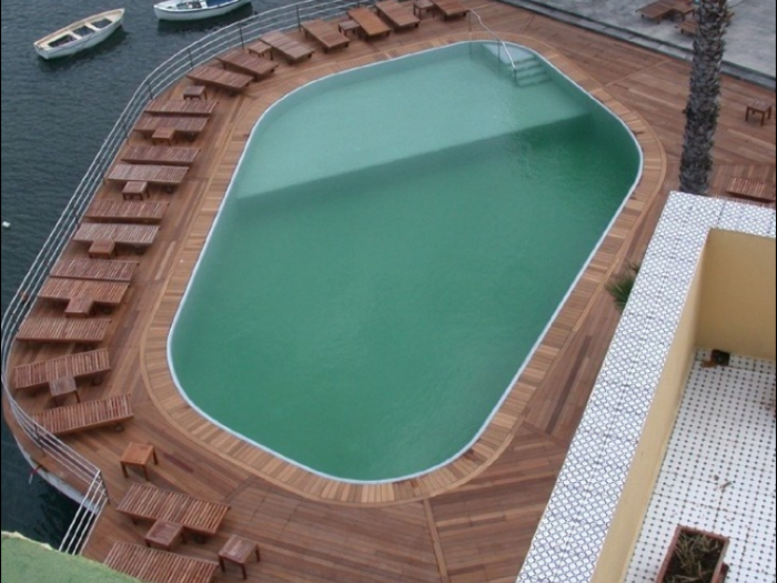 Archisio - Solo Parquet Resine Microcemento - Progetto Realizzazione pavimento in parquet bordo piscine