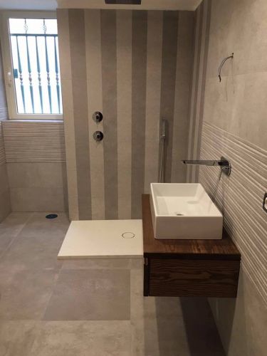 Archisio - Termoidraulica Zennari srl - Progetto Arredo completo di bagni