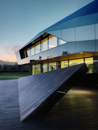 Archisio - Porta Rossa spa - Progetto Oficina vidre negre