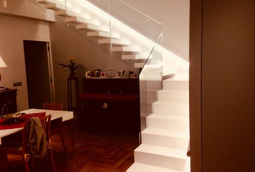 Archisio - Alfio Carmelo Lombardo - Progetto Steel staircase covered in corian with glass in catania